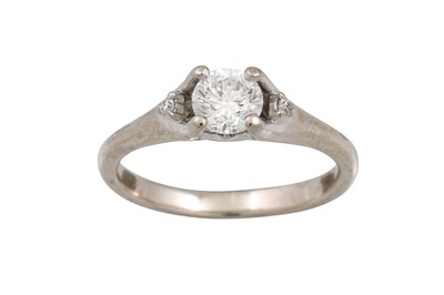 Lot 50 - A DIAMOND SOLITAIRE RING, mounted in white...