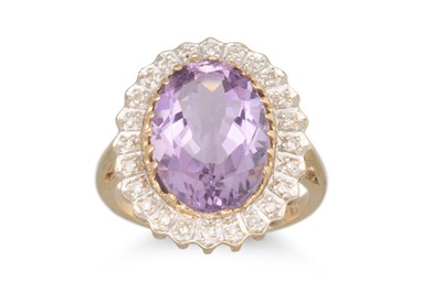 Lot 15 - AN AMETHYST AND DIAMOND CLUSTER RING, mounted...
