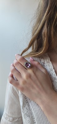 Lot 15 - AN AMETHYST AND DIAMOND CLUSTER RING, mounted...