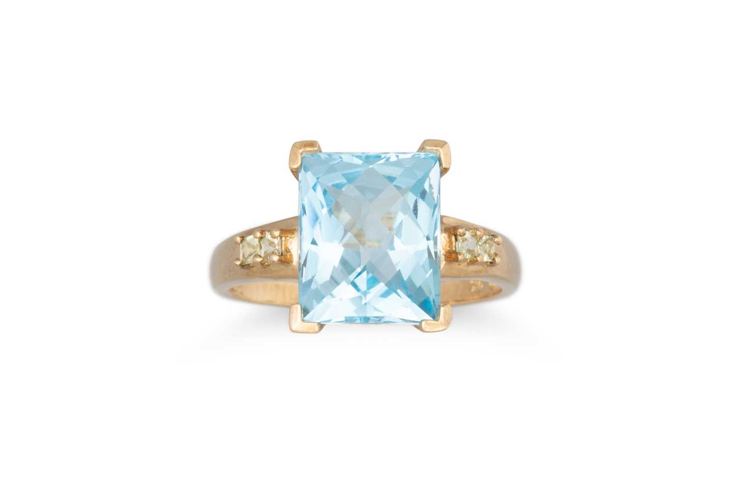 Lot 18 - A TOPAZ RING, mounted in 9ct yellow gold, size...