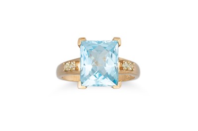 Lot 18 - A TOPAZ RING, mounted in 9ct yellow gold, size...