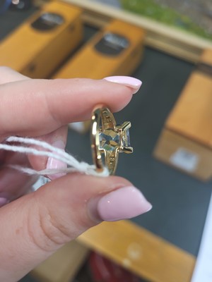 Lot 18 - A TOPAZ RING, mounted in 9ct yellow gold, size...