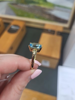 Lot 18 - A TOPAZ RING, mounted in 9ct yellow gold, size...