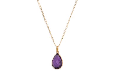 Lot 21 - AN AMETHYST PENDANT, the bezel set mixed cut...
