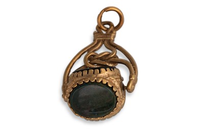 Lot 50 - A 9CT GOLD SWIVEL SET SEAL, set with carnelian,...