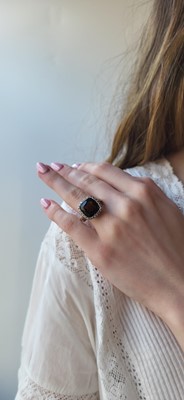Lot 27 - A SMOKY QUARTZ AND DIAMOND CLUSTER RING,...