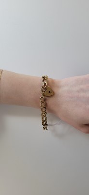 Lot 37 - A 9CT GOLD DOUBLE LINK CURB BRACELET, 15.9 g.