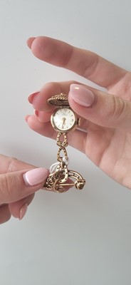 Lot 62 - A VINTAGE GOLD NURSE'S FOB WATCH, with...