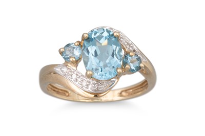 Lot 73 - A TOPAZ AND DIAMOND CLUSTER RING, the central...
