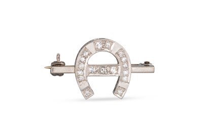 Lot 74 - A VINTAGE DIAMOND HORSESHOE BROOCH, mounted in...