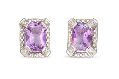 Lot 106 - A PAIR OF AMETHYST AND DIAMOND EARRINGS, the...