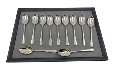 Lot 455 - A SET OF ELEVEN ENGLISH SILVER DESSERT SPOONS,...