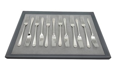 Lot 458 - A MATCHED SET OF TWELVE IRISH SILVER TABLE...