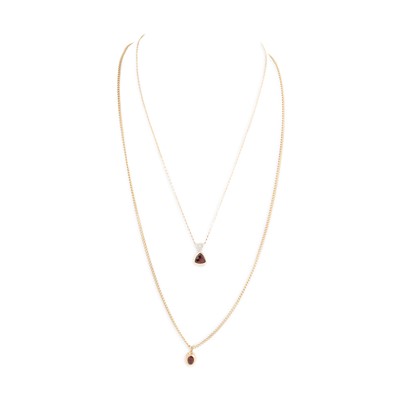 Lot 119 - A 9CT YELLOW GOLD GARNET AND DIAMOND PENDANT,...