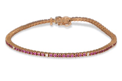 Lot 308 - A PINK SAPPHIRE AND DIAMOND LINE BRACELET,...