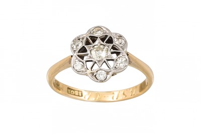 Lot 153 - A VINTAGE DIAMOND CLUSTER RING, mounted in...