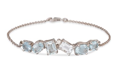 Lot 240 - AN AQUAMARINE AND DIAMOND BRACELET, the six...