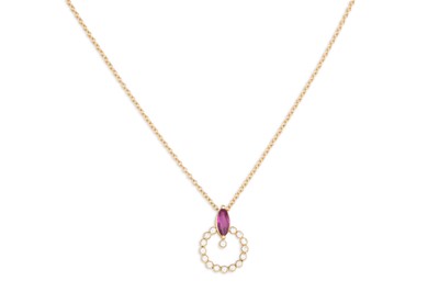 Lot 385 - A RUBY AND DIAMOND CLUSTER PENDANT, mounted in...