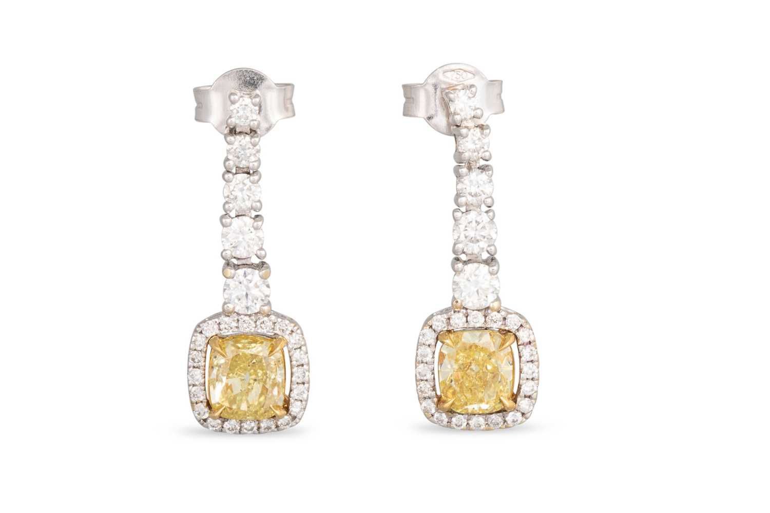 Lot 409 - A PAIR OF DIAMOND DROP EARRINGS, comprising...