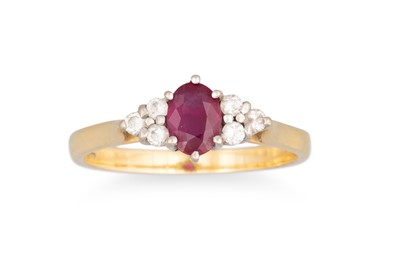 Lot 76 - A RUBY AND DIAMOND RING, the oval ruby to...
