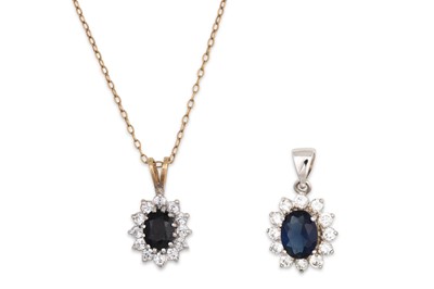 Lot 42 - TWO GOLD PENDANTS, together with a chain, 4.6 g.