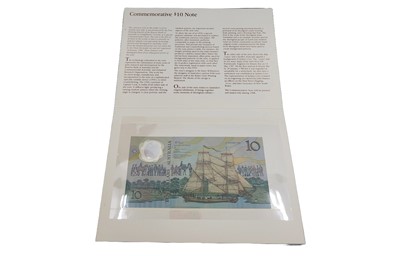 Lot 475 - AN AUSTRALIAN $10 AD BANKNOTE, a proof US coin...