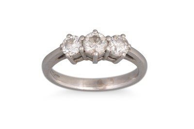Lot 174 - A DIAMOND THREE STONE RING, mounted in...