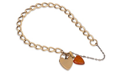 Lot 207 - A 9CT GOLD AND GARNET SET BRACELET, 7.25"...