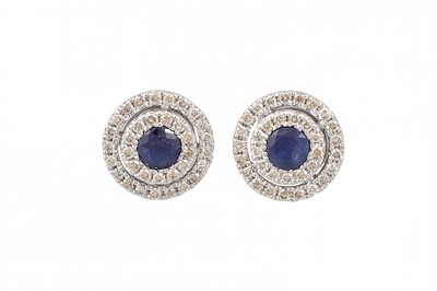 Lot 18 - A PAIR OF DIAMOND AND SAPPHIRE CLUSTER...
