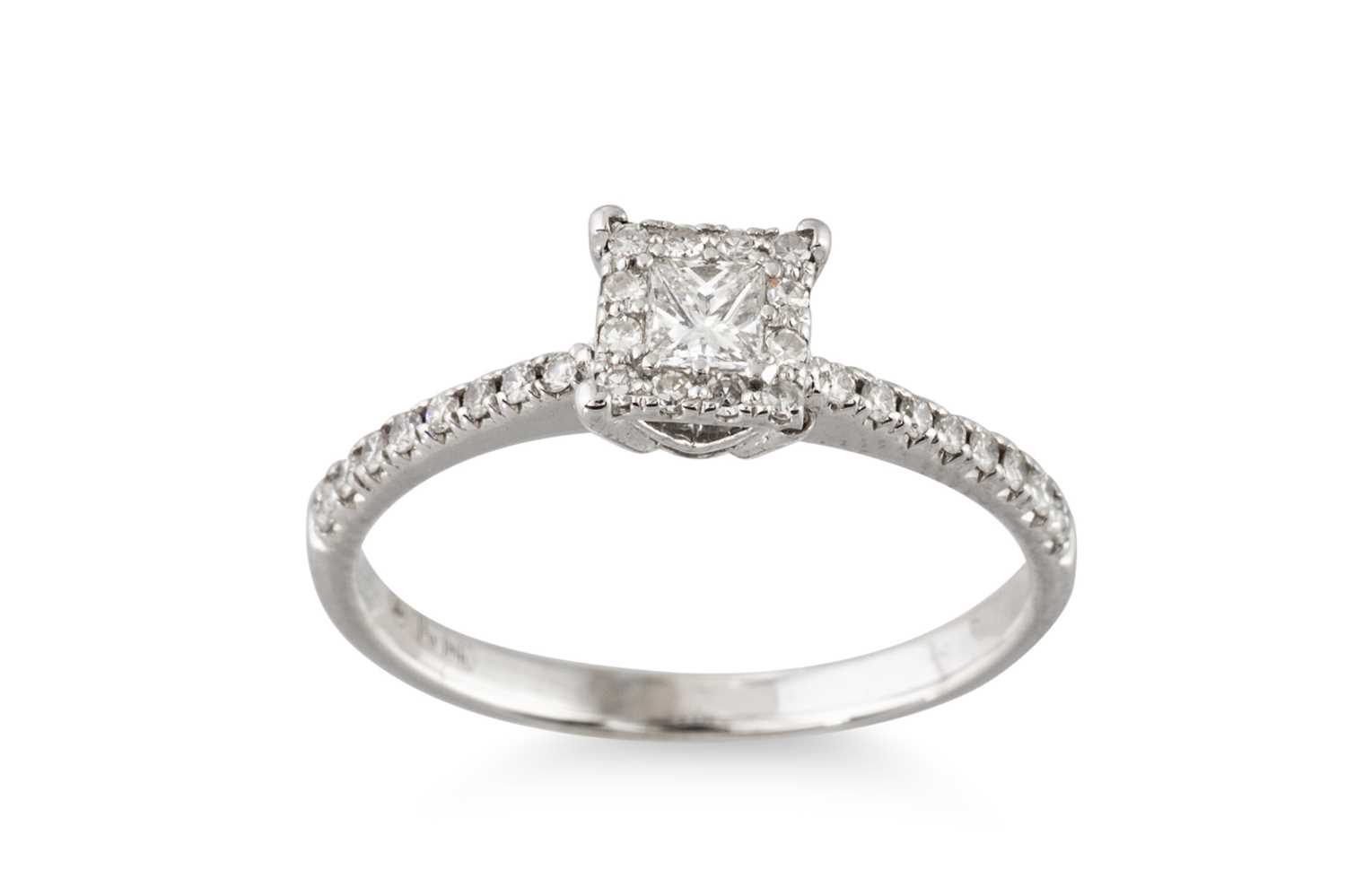 Lot 56 - A DIAMOND CLUSTER RING, set with a princess...