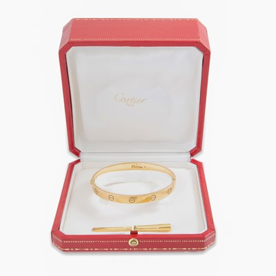 Lot 272 - A CARTIER 'LOVE' BANGLE, in 18ct yellow gold,...