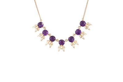Lot 23 - AN AMETHYST NECKLACE, set with five circular...