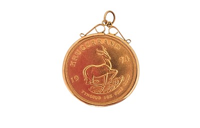 Lot 374 - A 1974 KRUGGERAND, and a loose mounted pendant,...