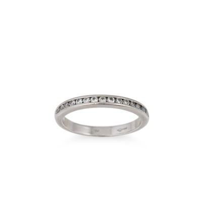 Lot 284 - A DIAMOND HALF ETERNITY RING, channel set with...