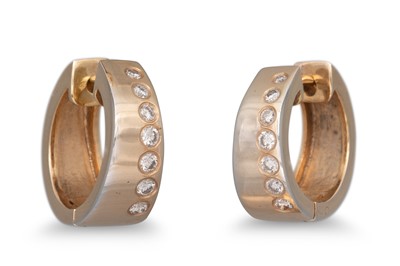 Lot 140 - A PAIR OF DIAMOND SET HOOP EARRINGS, mounted...