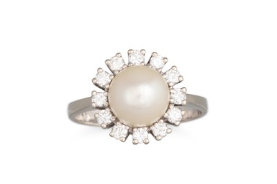 Lot 141 - A DIAMOND AND PEARL RING, mounted in 14ct...