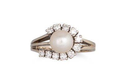 Lot 199 - A DIAMOND AND PEARL RING, mounted in 14ct...