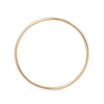 Lot 114 - A YELLOW GOLD BANGLE, 8.5”/21 cm circumference,...