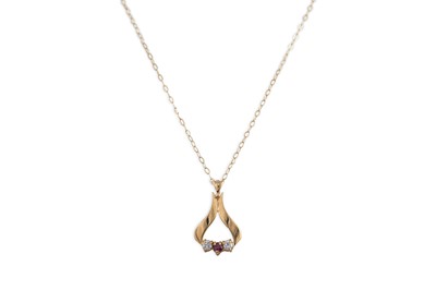 Lot 143 - THREE 9CT GOLD CHAINS, and pendants, 10 g.