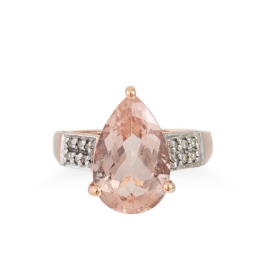 Lot 17 - A MORGANITE AND DIAMOND RING, the pear shaped...