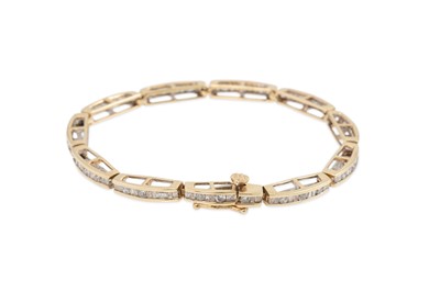 Lot 23 - A DIAMOND SET BRACELET, set with round...