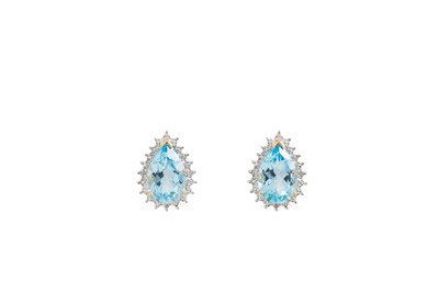 Lot 74 - A PAIR OF DIAMOND AND TOPAZ EARRINGS, the pear...