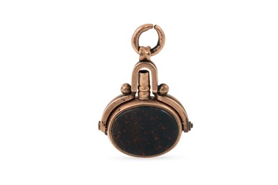 Lot 311 - A 9CT GOLD SWIVEL SEAL WATCH KEY, set with...