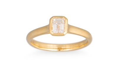 Lot 123 - A DIAMOND SET RING, the bezel cut emerald cut...