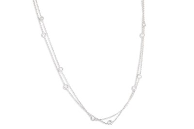 Lot 279 - A DIAMOND SET CHAIN, the brilliant cut collet...