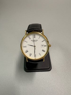 Lot 365 - A RAYMOND WEIL GENT'S WRISTWATCH, round face,...