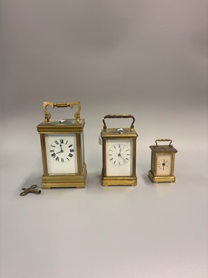 Lot 426 - A GROUP OF THREE ANTIQUE BRASS FRAMED CARRIAGE...