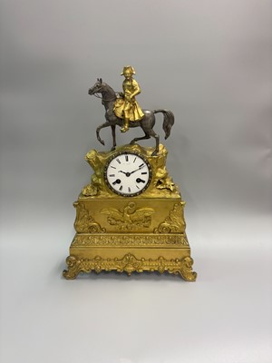 Lot 429 - A 19TH CENTURY FRENCH ORMOLU CLOCK, surmounted...