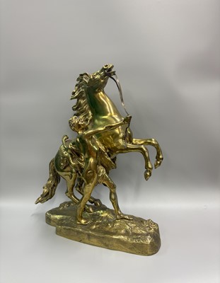 Lot 423 - A LARGE PAIR OF BRASS MARLY HORSES
