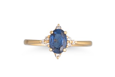 Lot 213 - A SAPPHIRE AND DIAMOND RING, the oval sapphire...